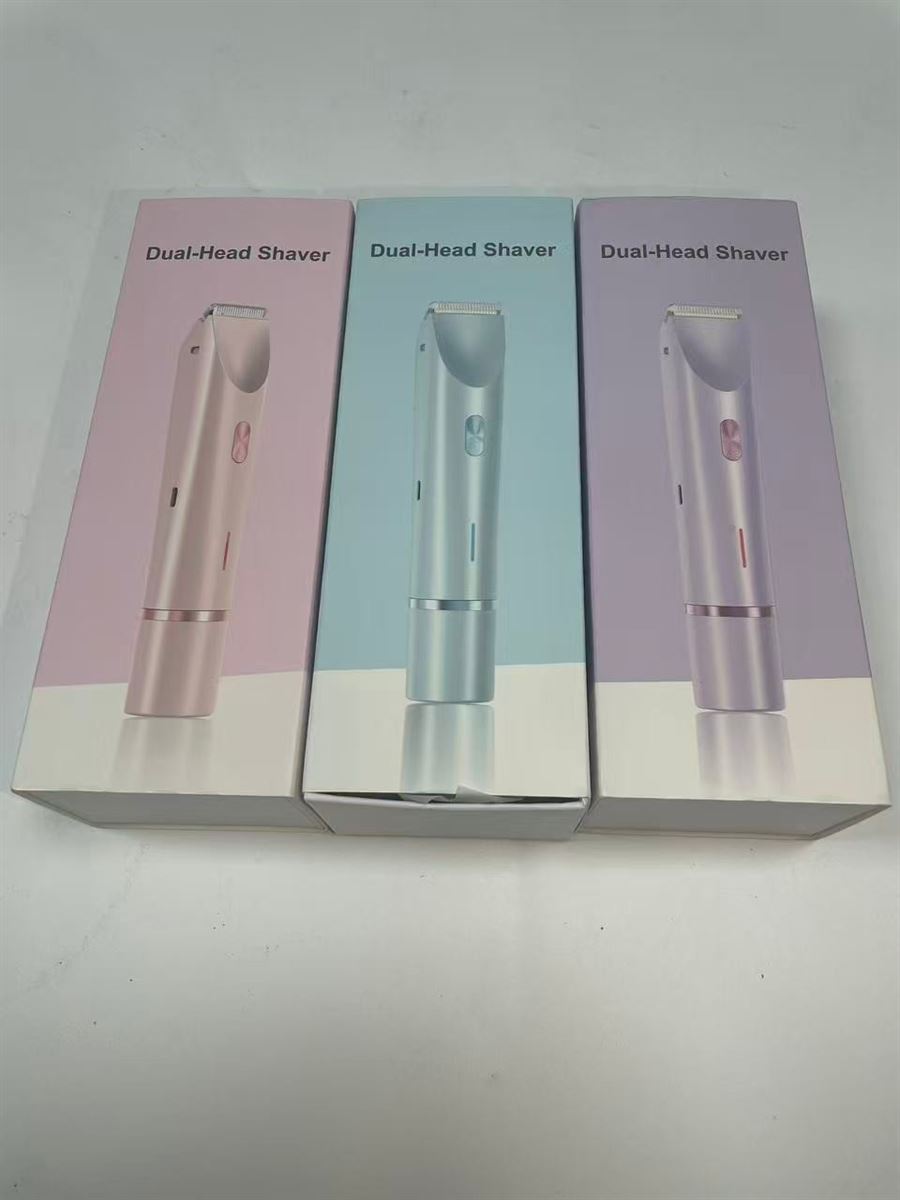 Three Dual-Head Shaver retail cartons in pink, blue and lilac